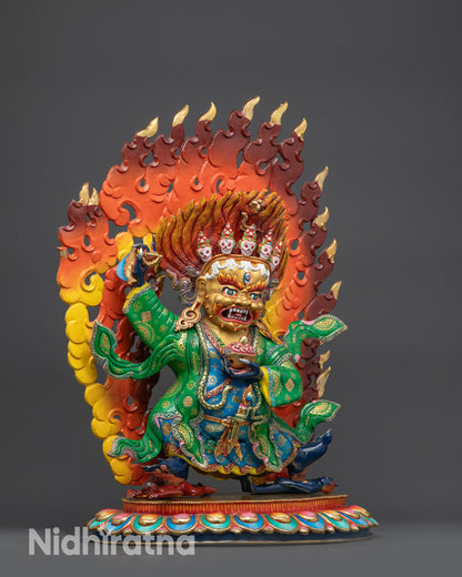 Side angle Mahakala Bernagchen Sculpture with serpent and skull crown detail