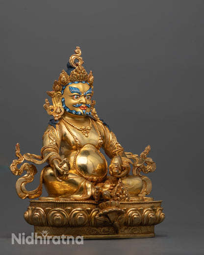 Side angle close-up of Dzambhala Statue showing detailed facial expression and rich 24k fire gold gilding