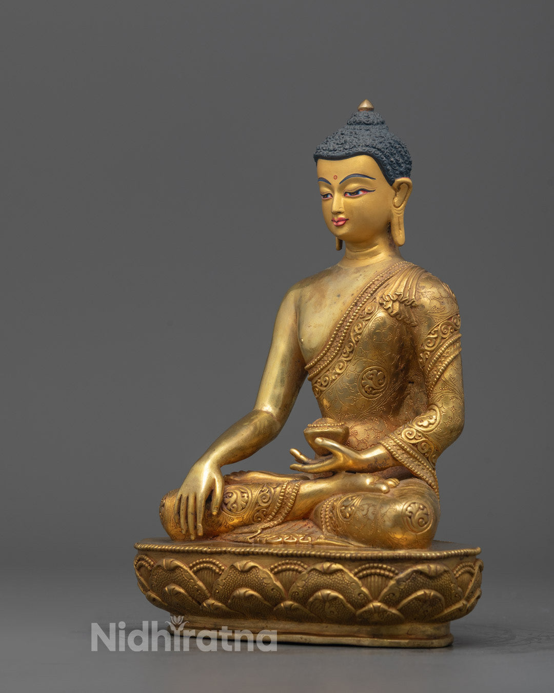 Side angle of 24k gold-gilded Shakyamuni Buddha Sculpture showcasing traditional Nepali
