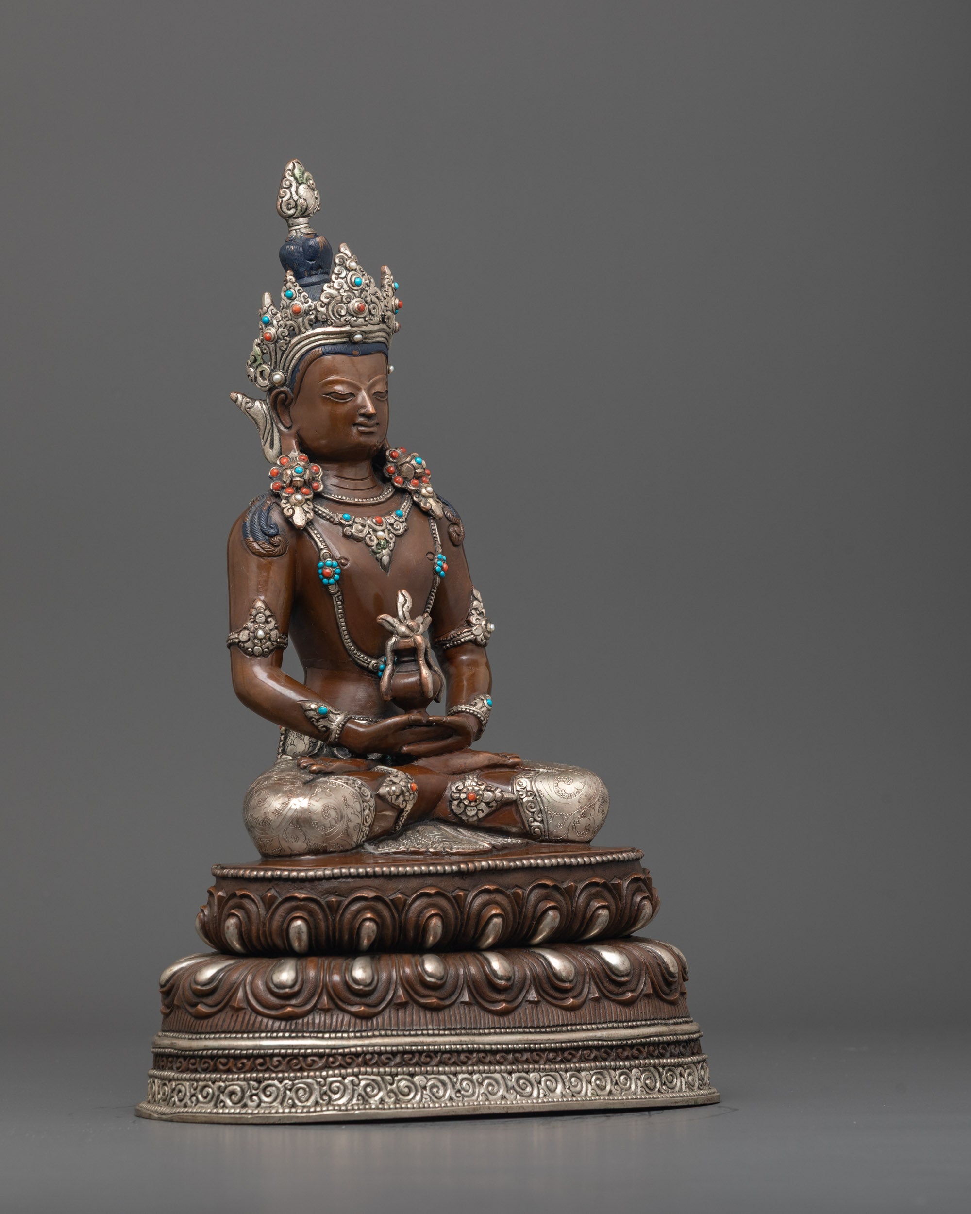 Side angle of Amitayus statue showing double-layered lotus base and dhyana mudra pose