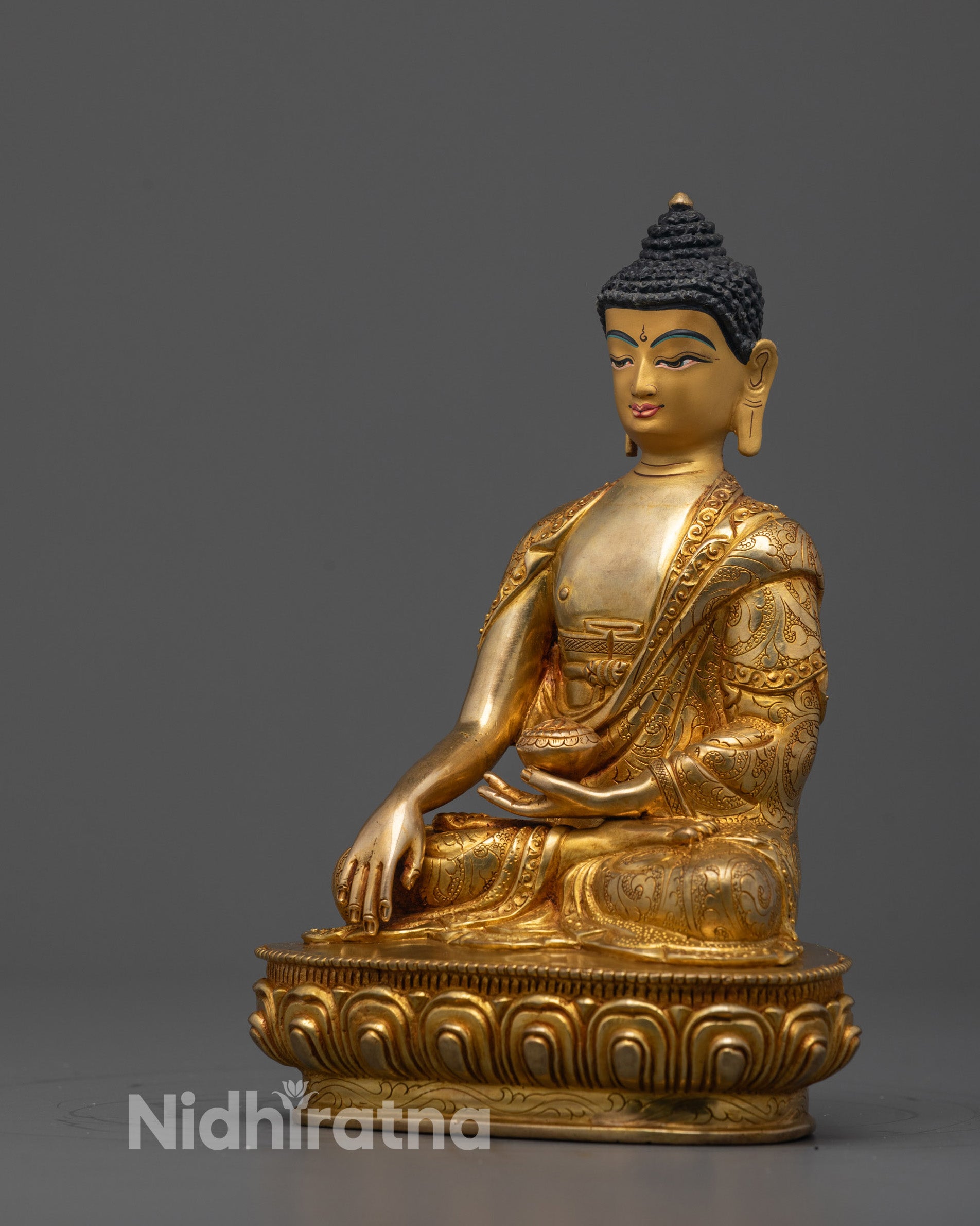 Side angle of Buddha Shakyamuni Statue showcasing detailed carvings on the robes