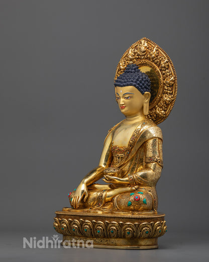 Side angle of Gautama Buddha sculpture showing detailed bhumisparsha mudra and carvings
