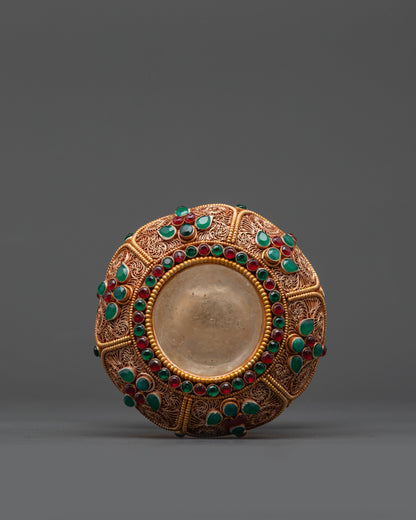 Side angle of Handmade Copper Rice Pot with crystal core and deity carvings