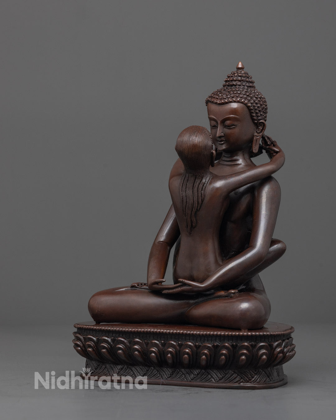 Side angle of Jambhala Wealth Deity Statue showing acrylic colors and lotus seat