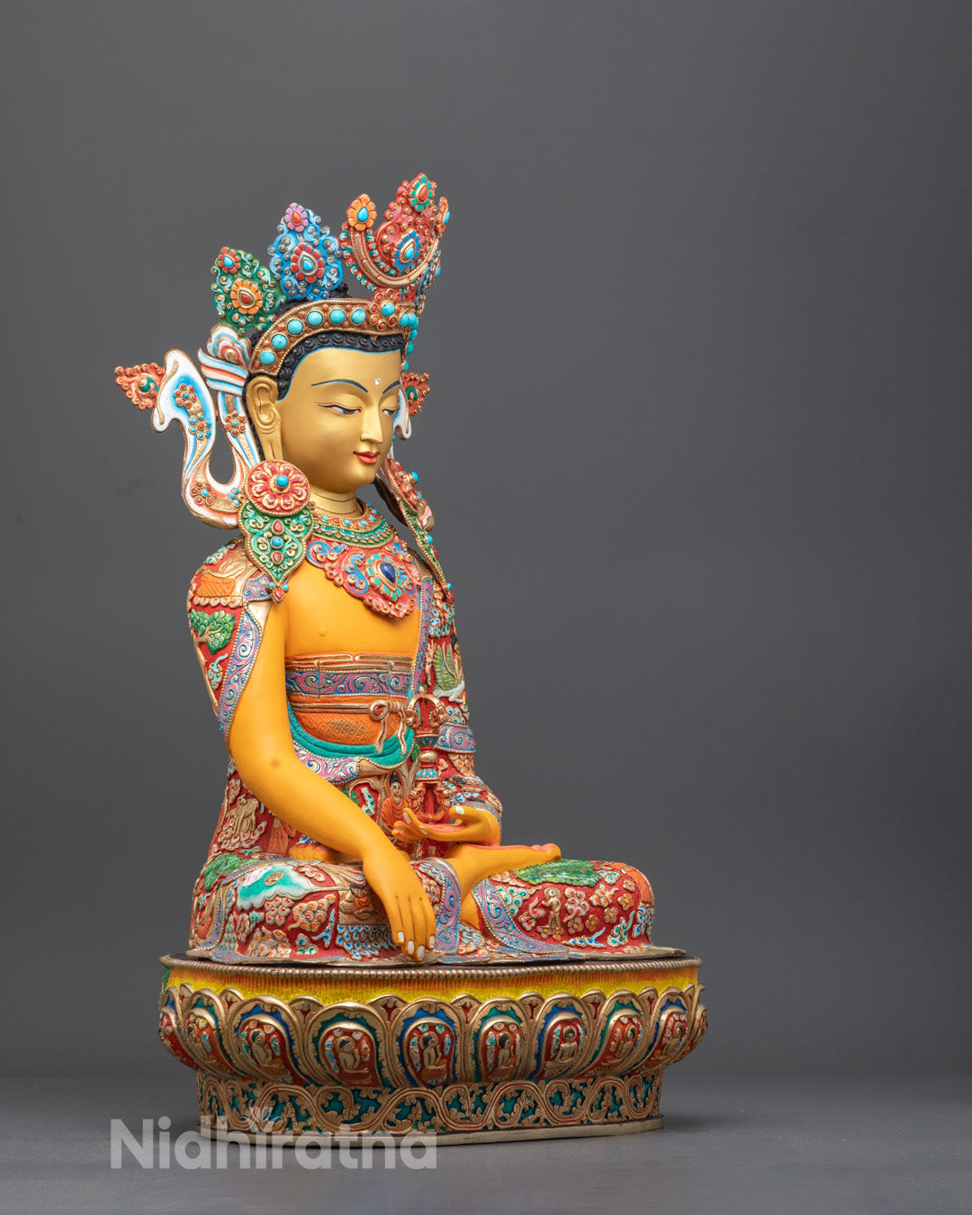 Mitrugpa Buddha sculpture highlighting premium craftsmanship and silver-gold plating