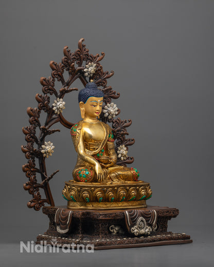 Side angle of Shakyamuni Buddha seated in meditation on a lotus base
