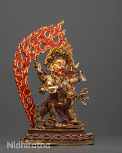 Side angle of Six-Armed Mahakala statue featuring six arms holding symbolic ritual objects