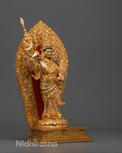 Side angle of Standing Guru Rinpoche statue showing flowing robes and trident khatvanga