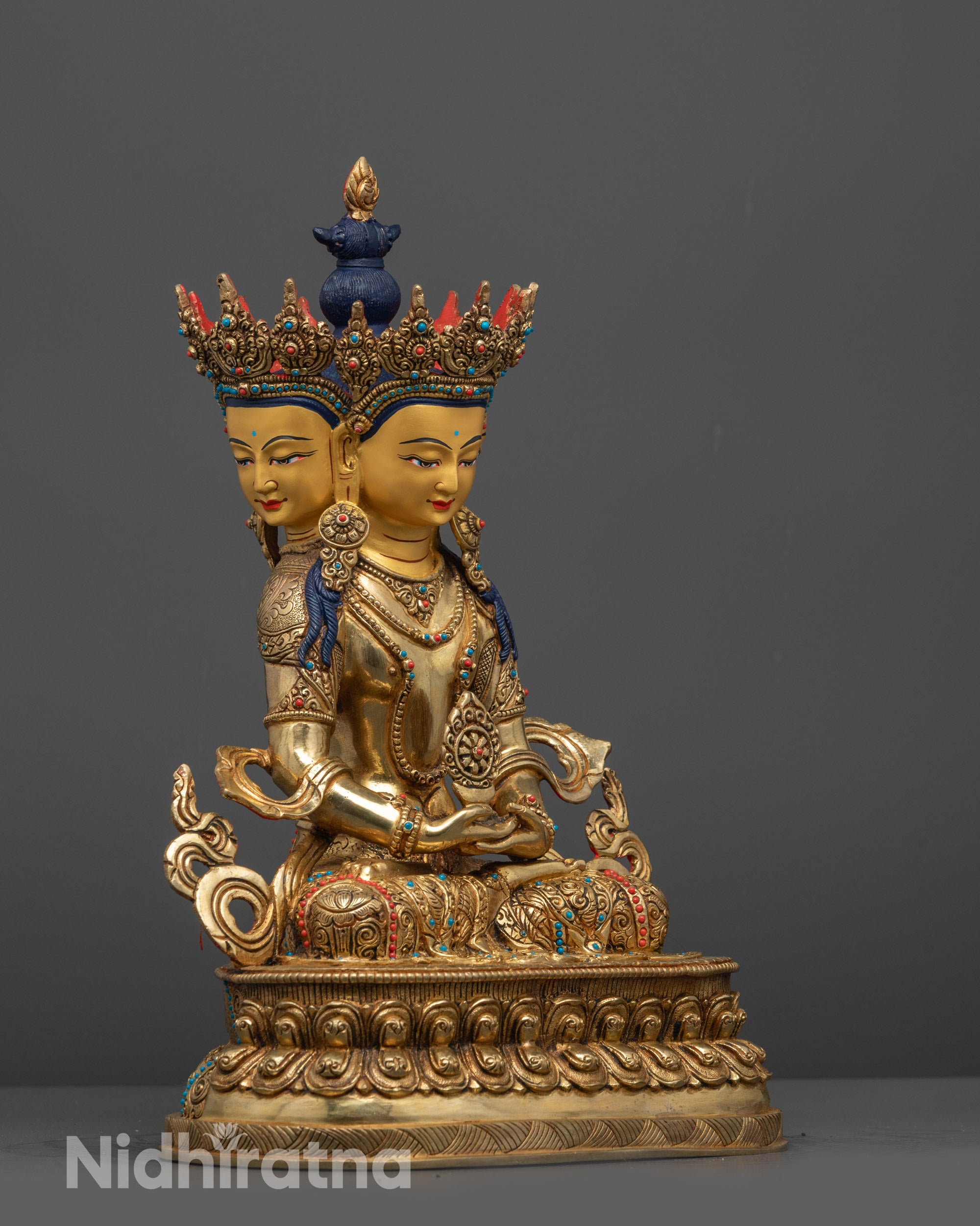 Side angle of Vairocana Buddha Statue highlighting copper base