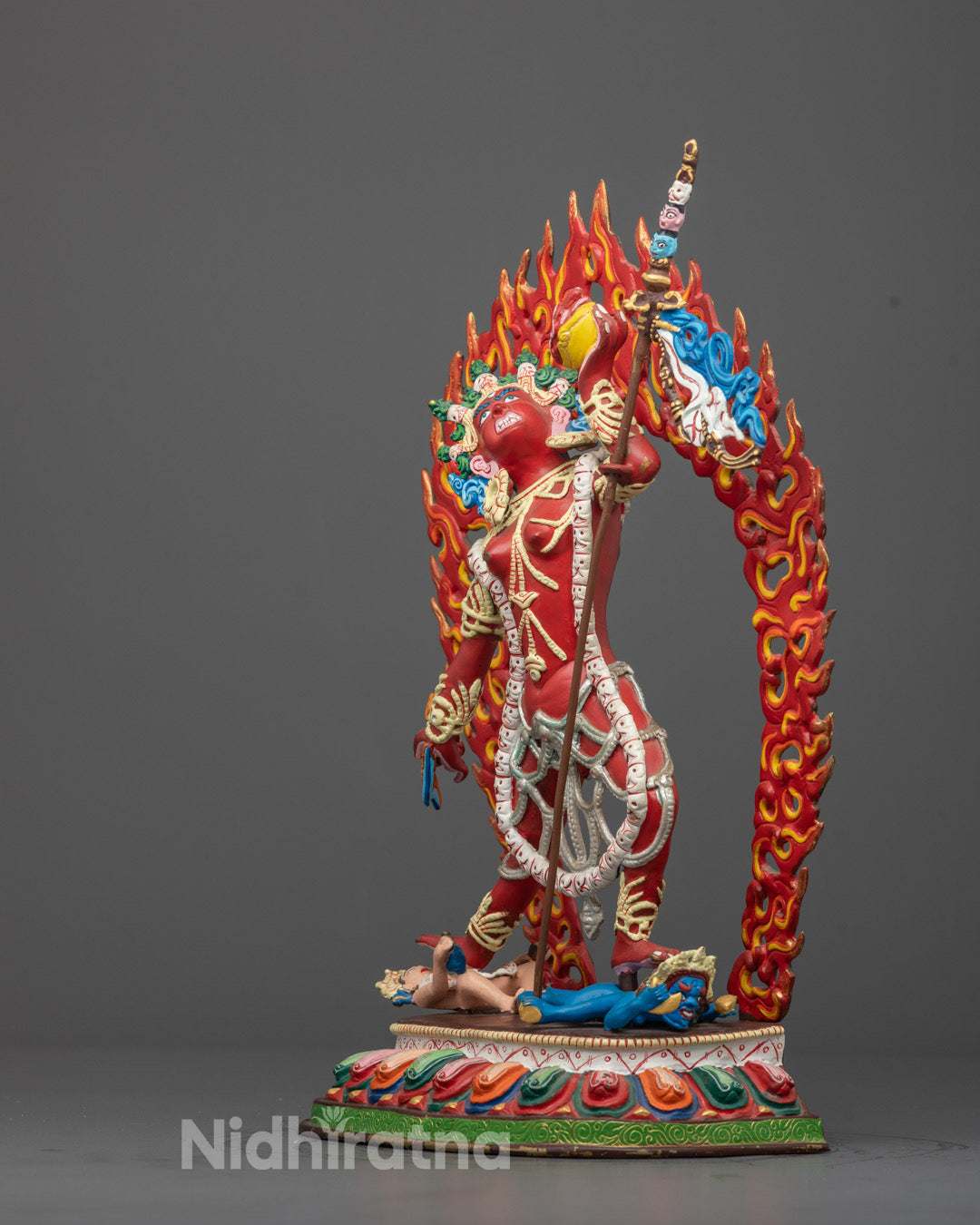 Side angle of beautifully detailed Vajrayogini sculpture in sleeping posture