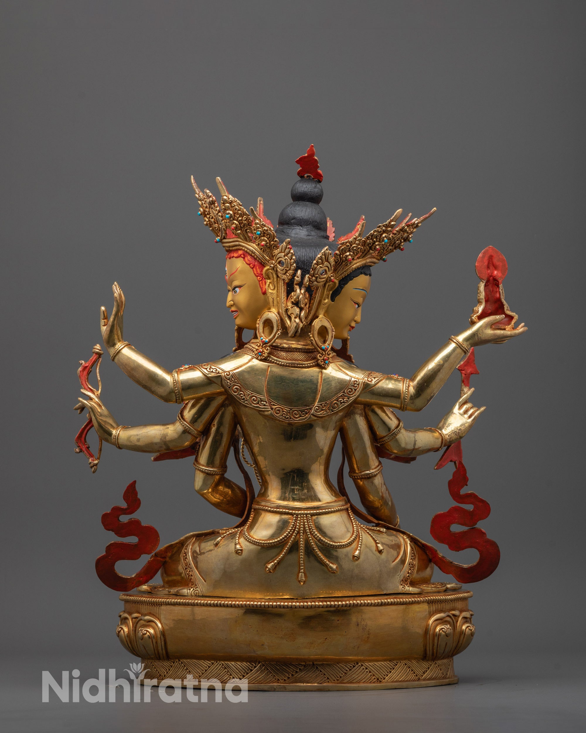 Side angle of gold fire-gilded Namgyalma Statue showing intricate carvings