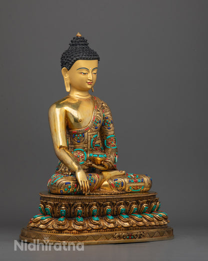 Side angle of gold fire-gilded Shakyamuni Buddha on double lotus throne with gems