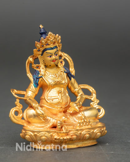 Side angle of gold gilded Dzambhala prosperity deity for temple shrine and business altar