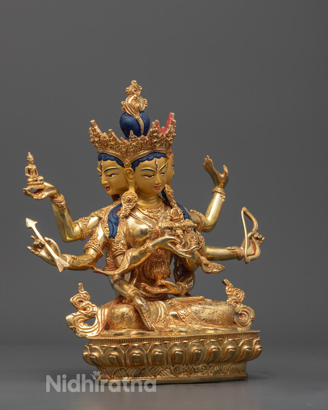 Side angle of hand-carved Namgyalma sculpture showing intricate detailing