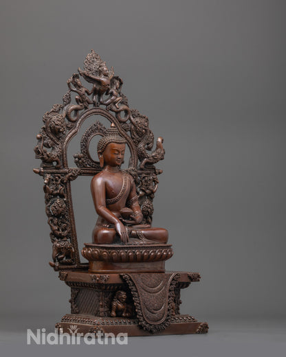 Side angle of hand-carved Shakyamuni Buddha Statue highlighting detailed robe