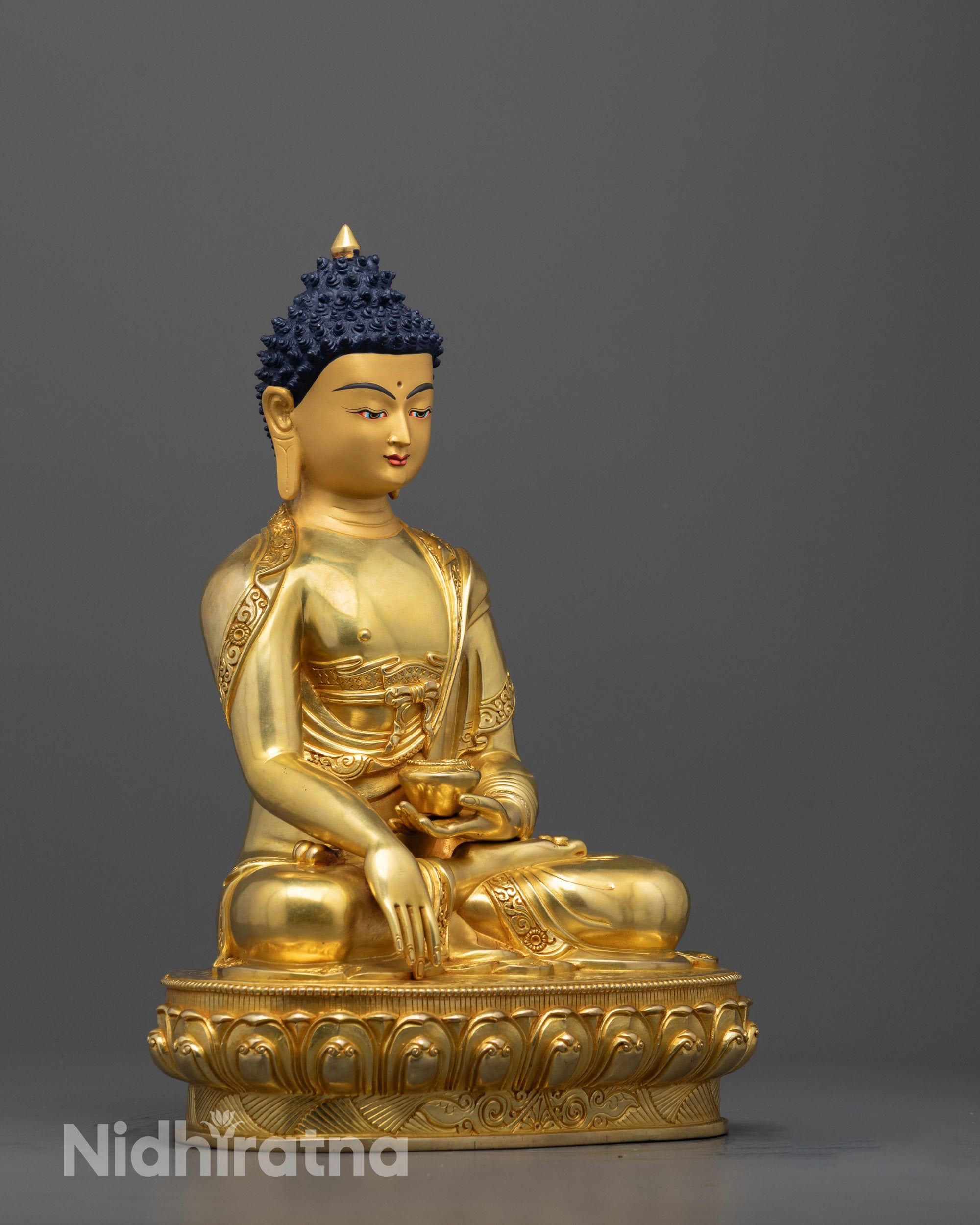 Side angle of handcrafted Buddha Shakyamuni statue highlighting lost wax casting details
