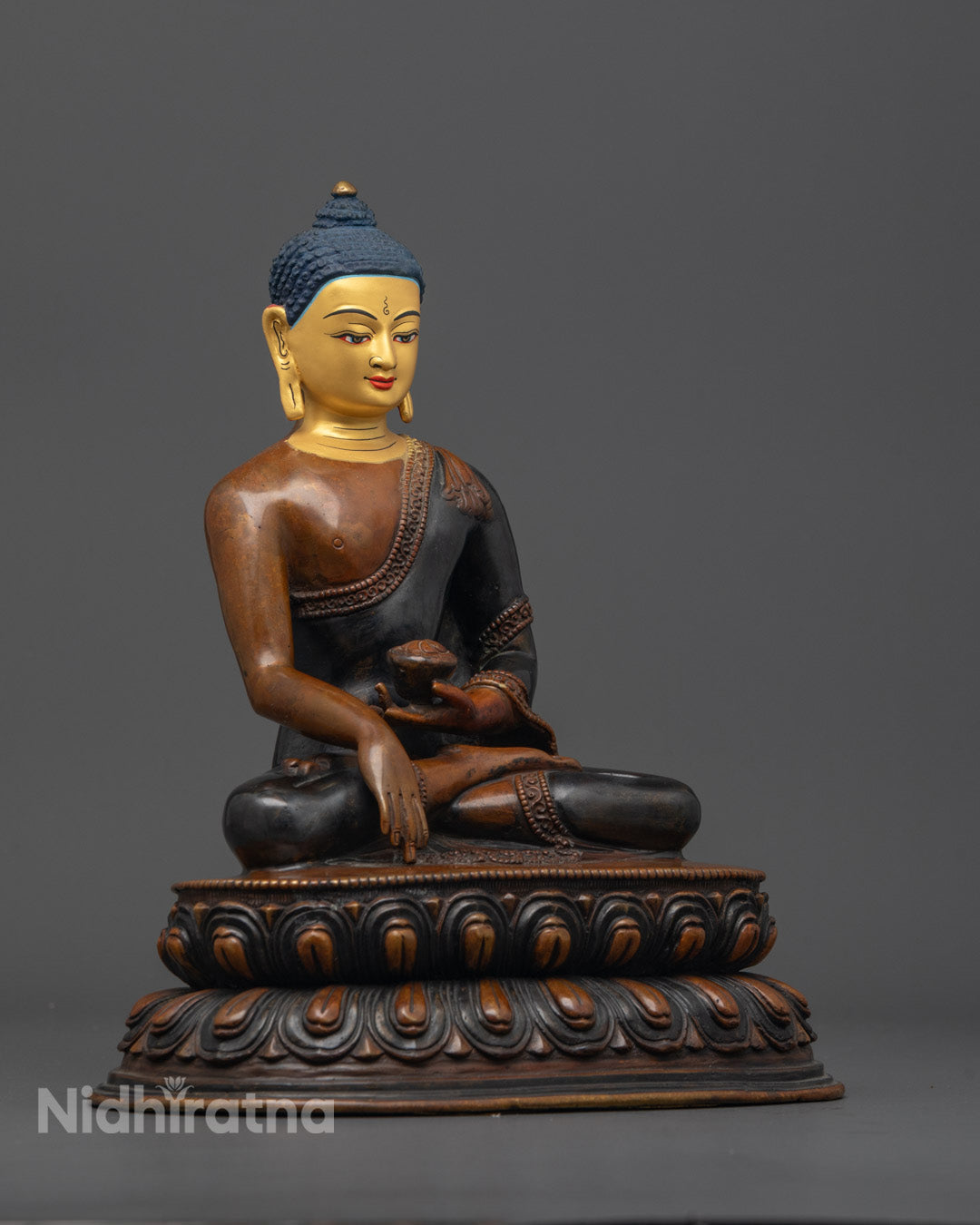 Side angle of handcrafted Buddha statue with oxidized copper finish and symbolic posture
