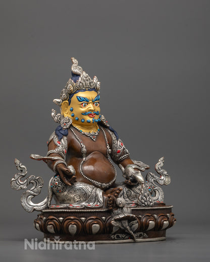Side angle of handcrafted Dzambhala Statue in royal ease pose, showcasing detailed craftsmanship
