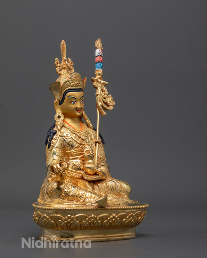 Side angle of handcrafted Guru Padmasambhava Sculpture with Khatvanga trident