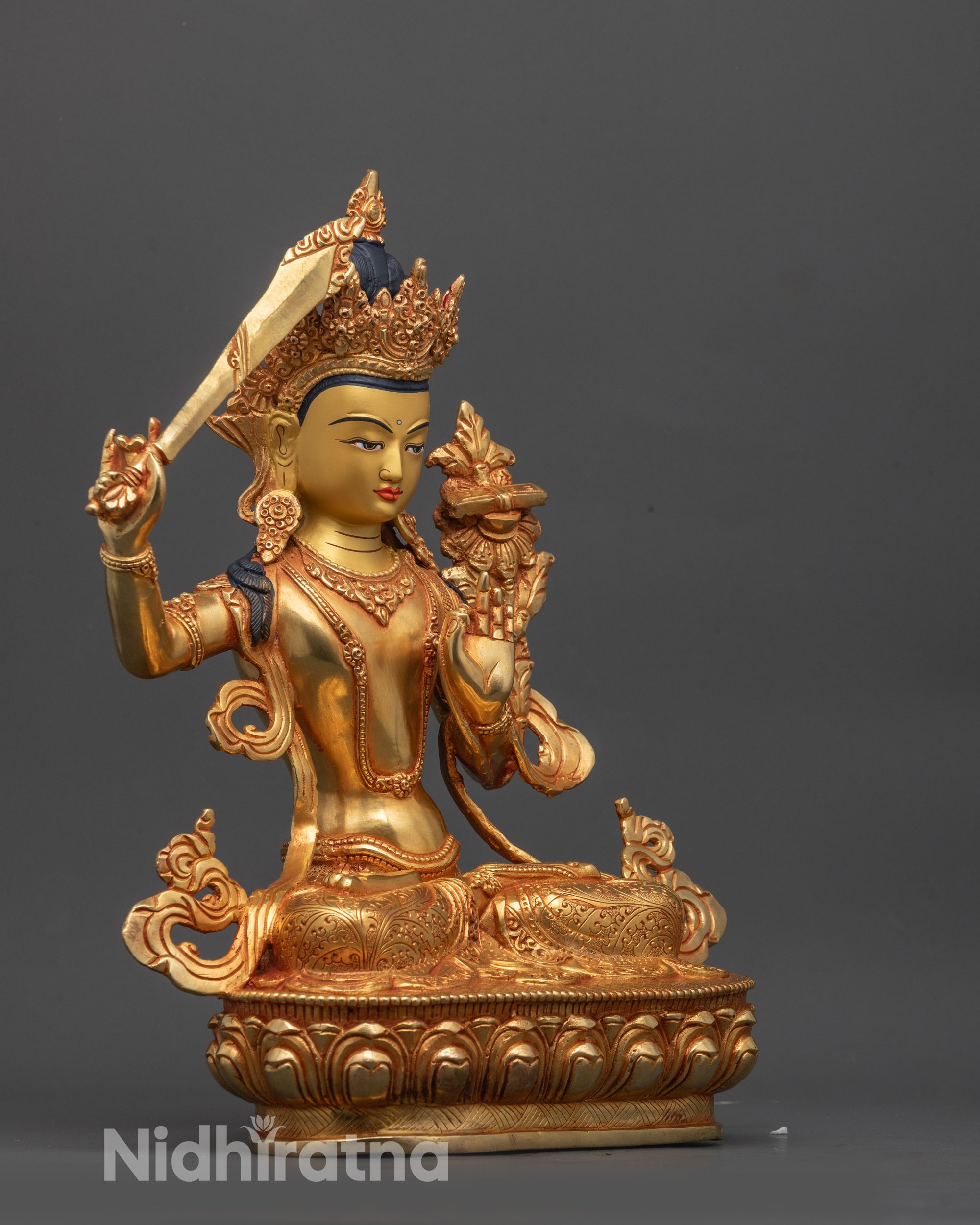 Side angle of handcrafted Manjushri Statue highlighting traditional Nepalese craftsmanship