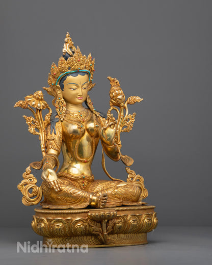 Side angle of handcrafted Mother Tara Statue showing uptala flower and flowing robe

