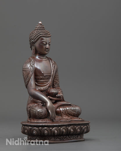 Side angle of handcrafted Shakyamuni Buddha seated in bhumisparsha mudra on lotus seat