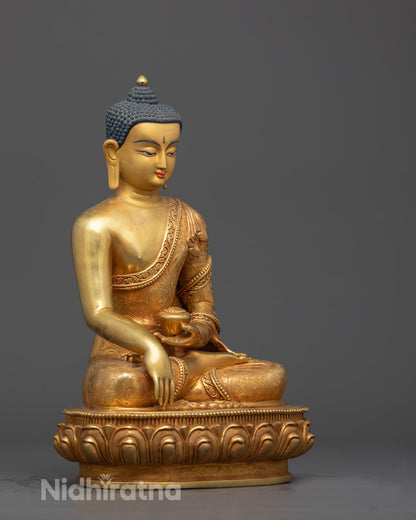 Side angle of handcrafted Shakyamuni Buddha statue holding Patra bowl in Bhumisparsha Mudra