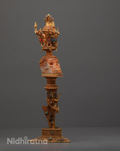 Side angle of handcrafted crystal Phurba showcasing intricate copper and acrylic design