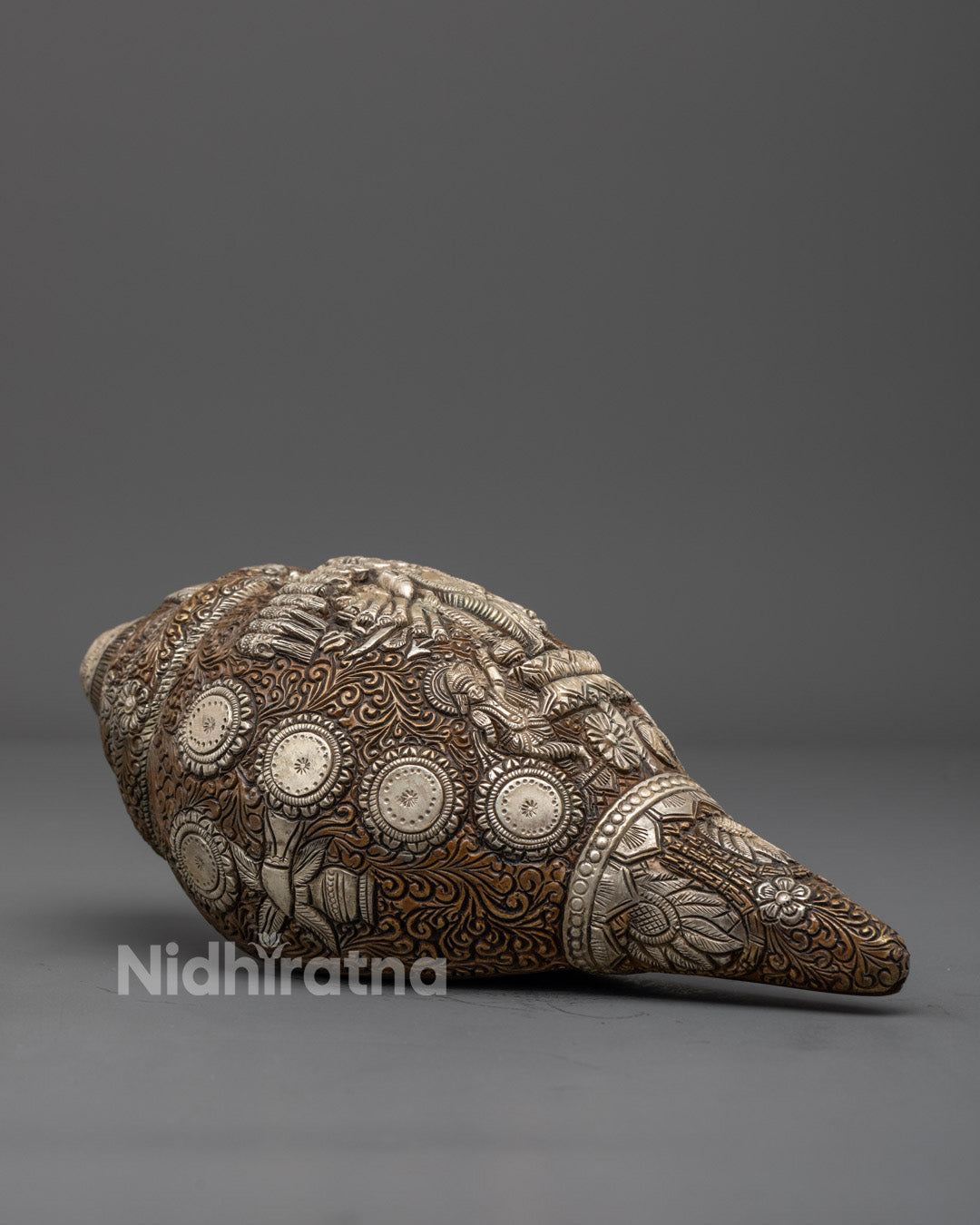 Side angle of handcrafted ritual conch shell ideal for meditation and worship display