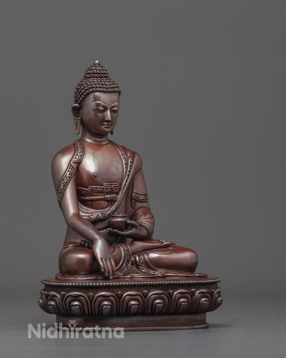 Side angle of oxidized Gautama Buddha on lotus throne showing detailed carving.