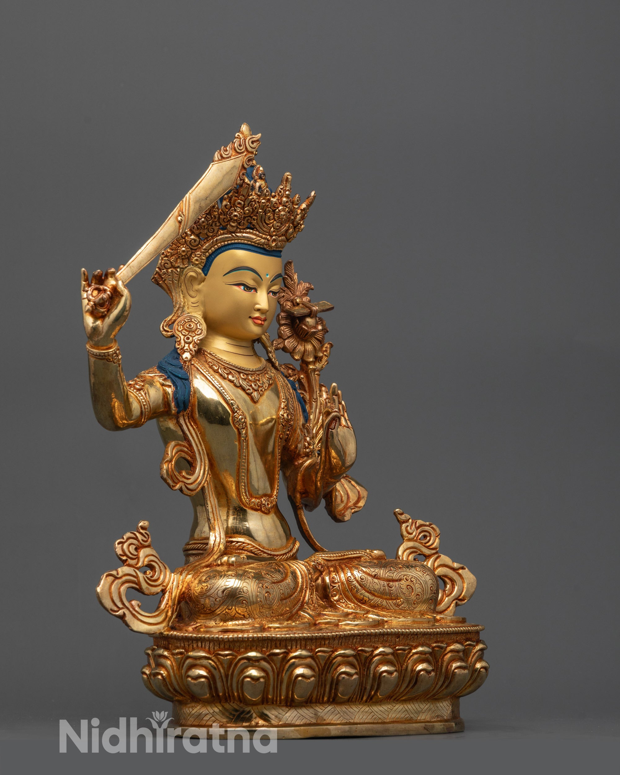 Side angle of premium copper Manjushri Statue from Nepal