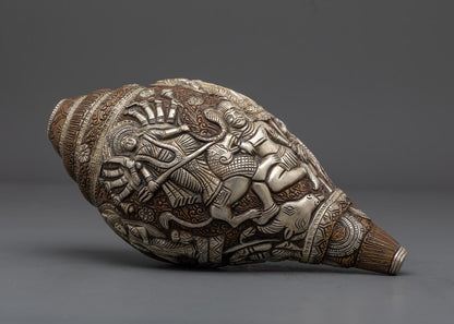 Side angle of sacred Durga Shankh showing filigree and deities, perfect for tantric rituals