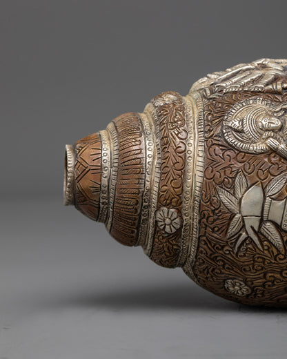 Side angle of sacred Durga Shankh showing filigree and deities, perfect for tantric rituals