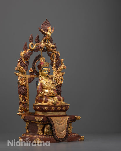 Side angle of statue showing khatvanga trident, vajra, kapala, and flowing tarpatika robe
