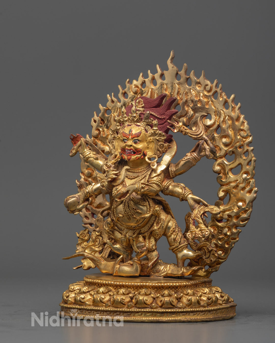Side angle of the Six Armed Mahakala Statue emphasizing the six arms
