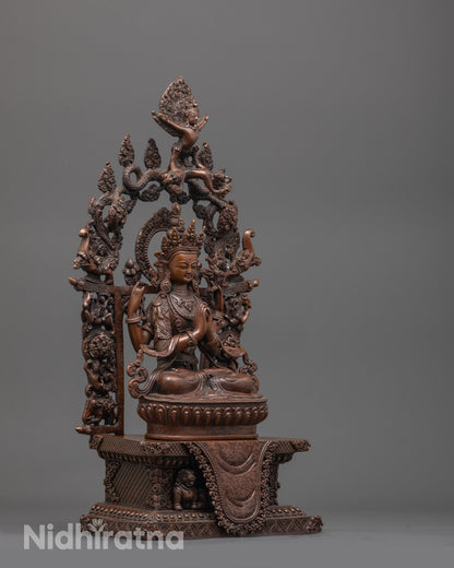 Side angle of the oxidized Chenrezig Statue revealing detailed robe patterns