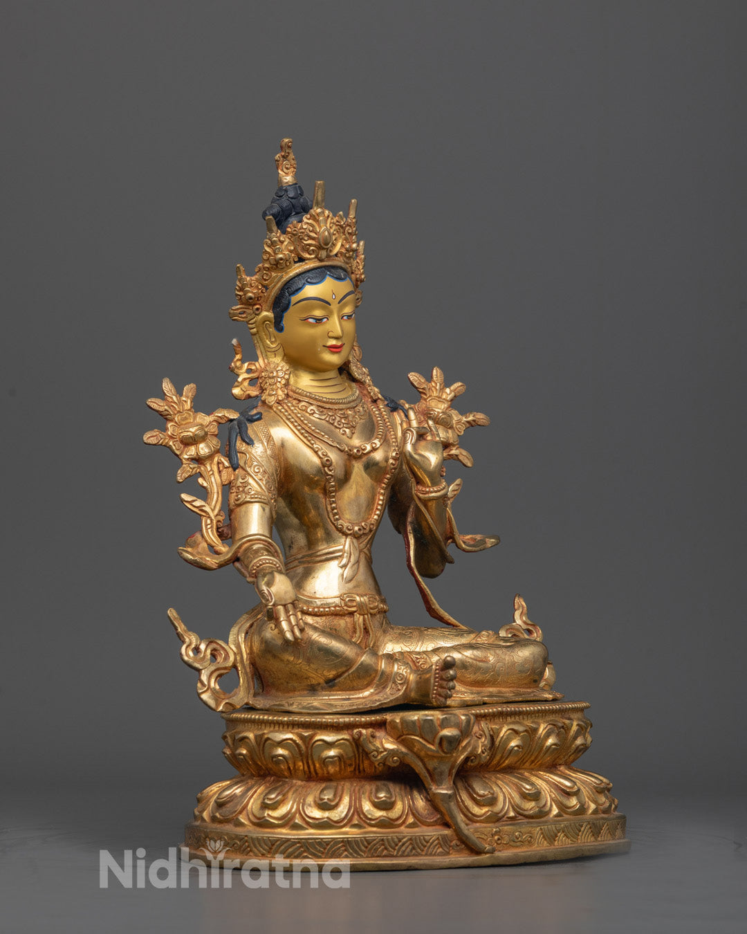 Side angle showing Gold Fire-gilded body and Mother Tara’s varada mudra hand gesture