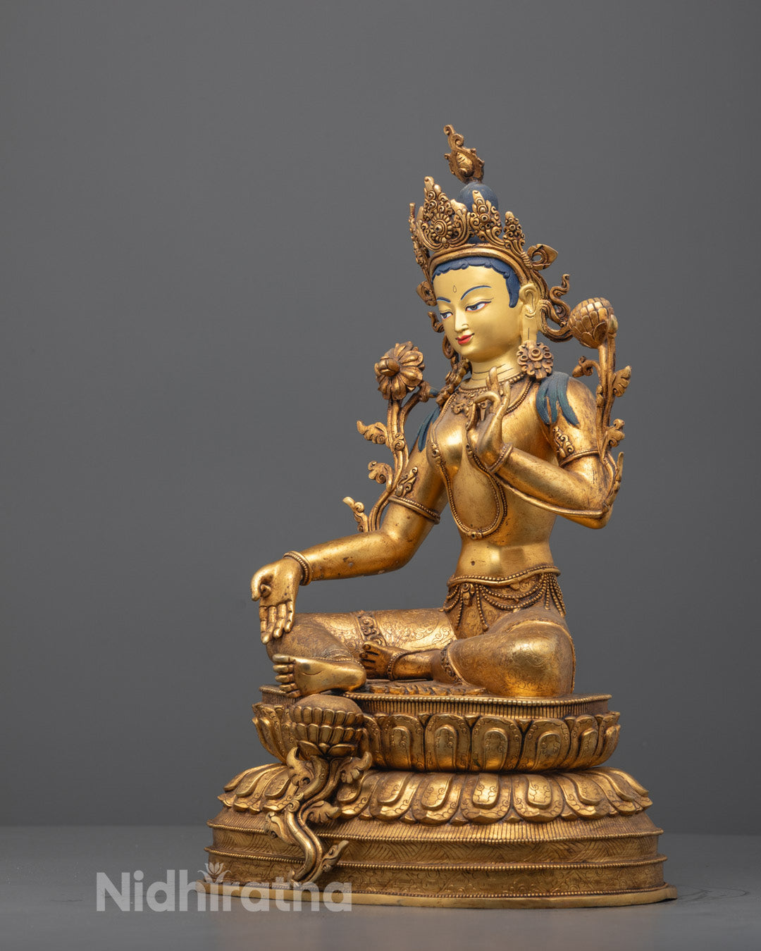 Side angle showing Tara Devi’s varada mudra and floating robe details