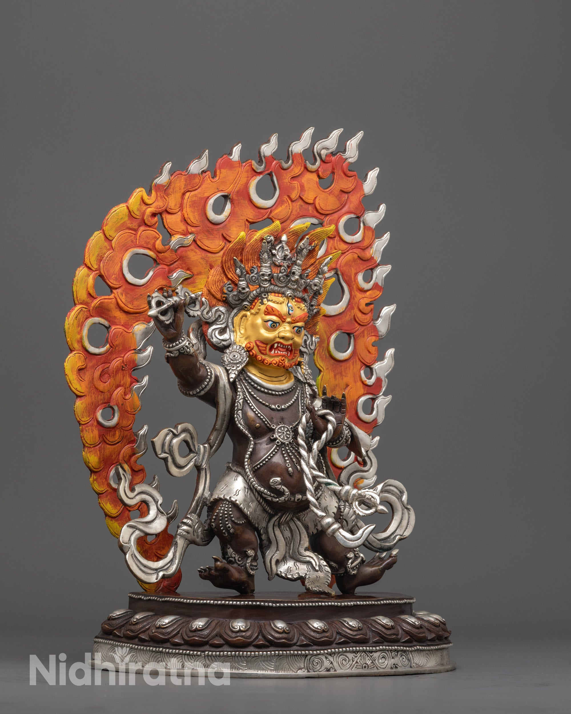 Side angle showing Vajrapani holding Vajra and Lasso with tiger skin garment patterns
