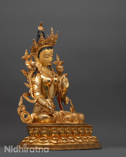Side angle showing White Tara statue’s Varada mudra hand and intricate lotus seat carving