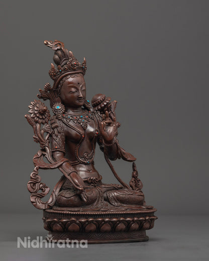 Side angle view showcasing the handcrafted details and flowing robes of the White Tara statue