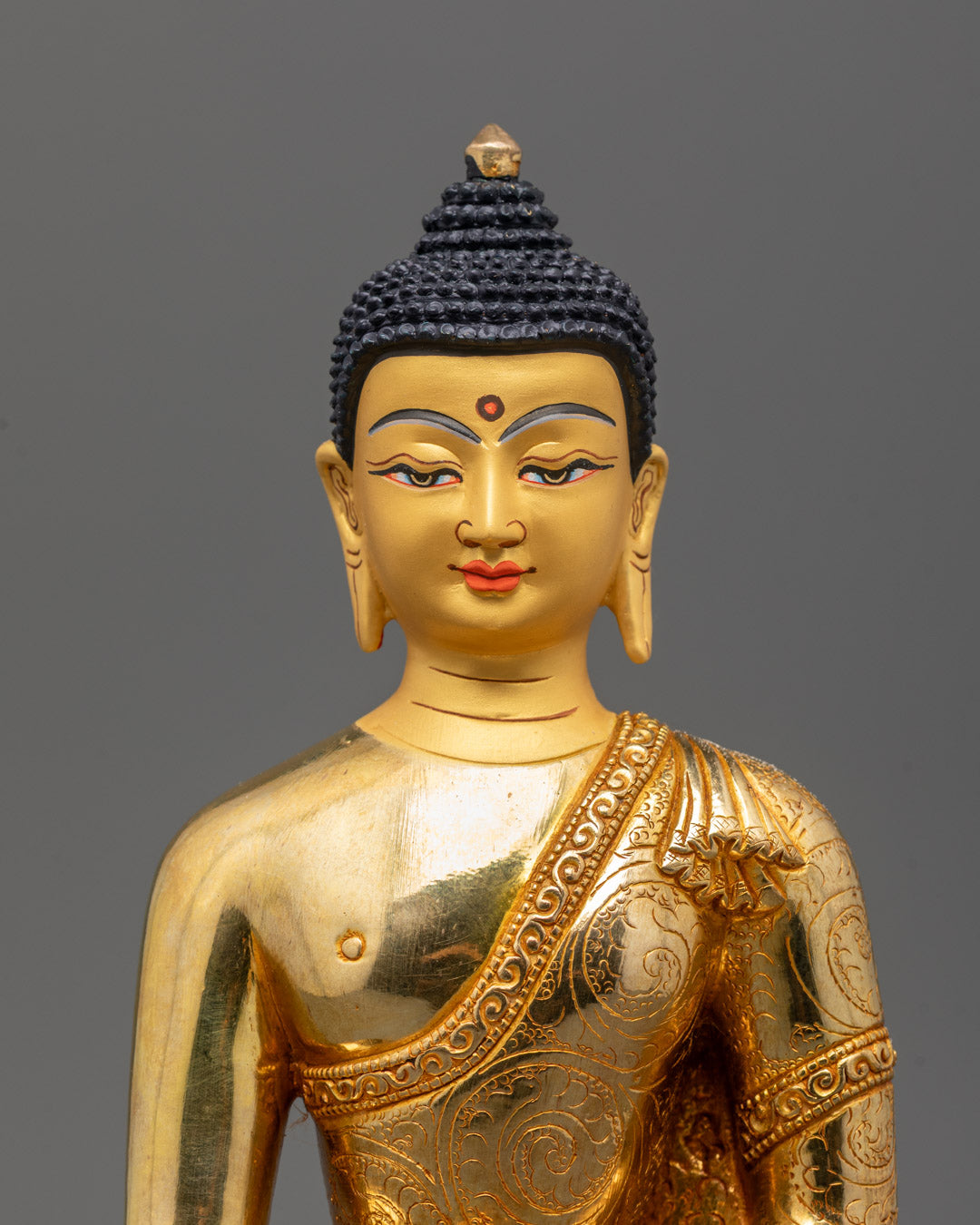 Side close-up of 24k fire-gilded Siddhartha Buddha Statue showing detailed facial expression
