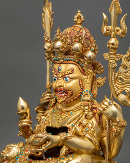 Side close-up of Hayagriva Yab-Yum statue showing four arms and lotus throne