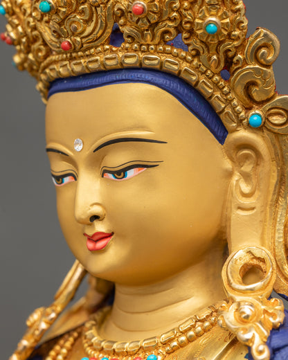 Side close-up of Simhada Chenrezig face with intricate crown and serene expression