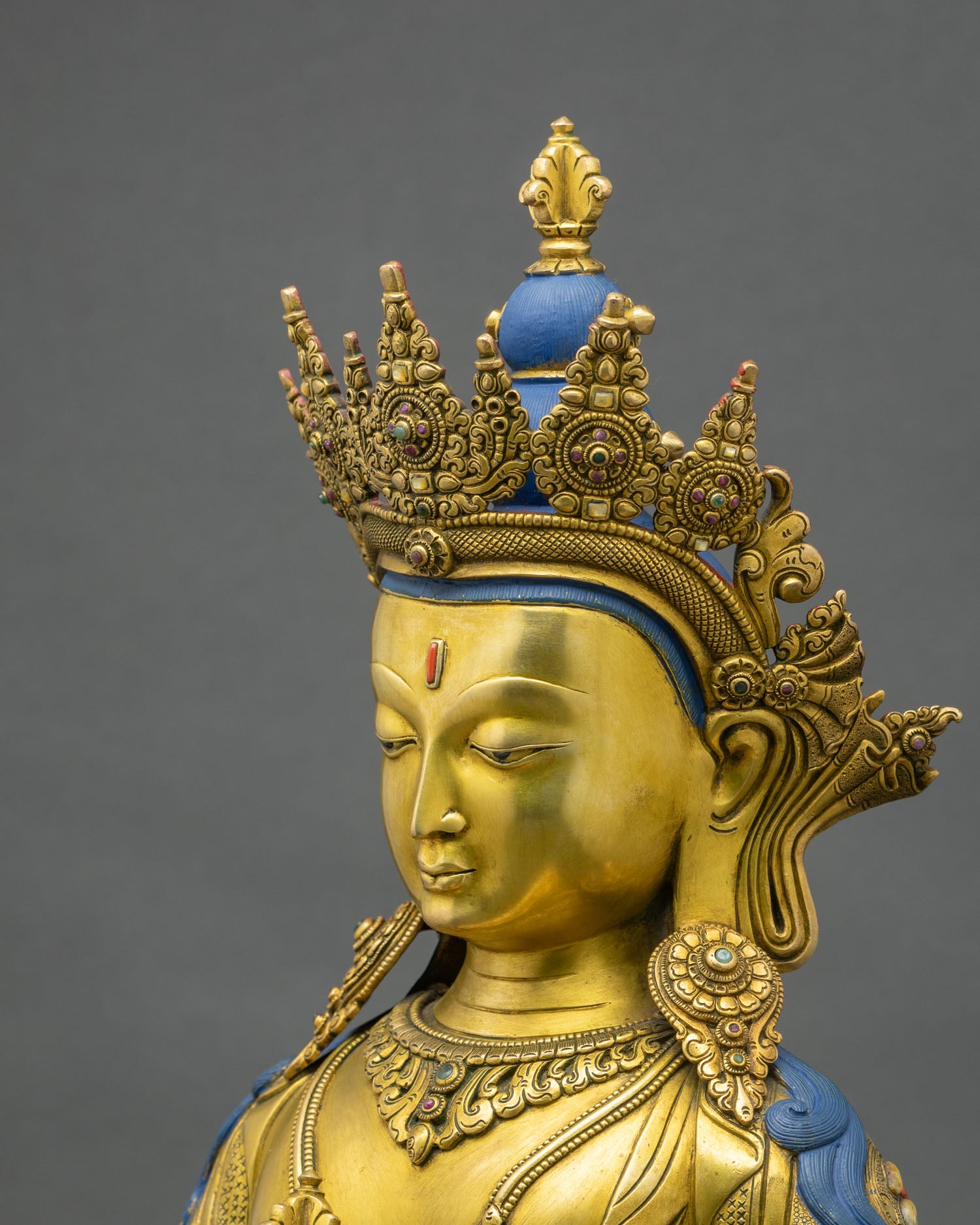vajrasattva-statue-side-close-up-gold-gilded-robes-lotus-base-handcrafted-details