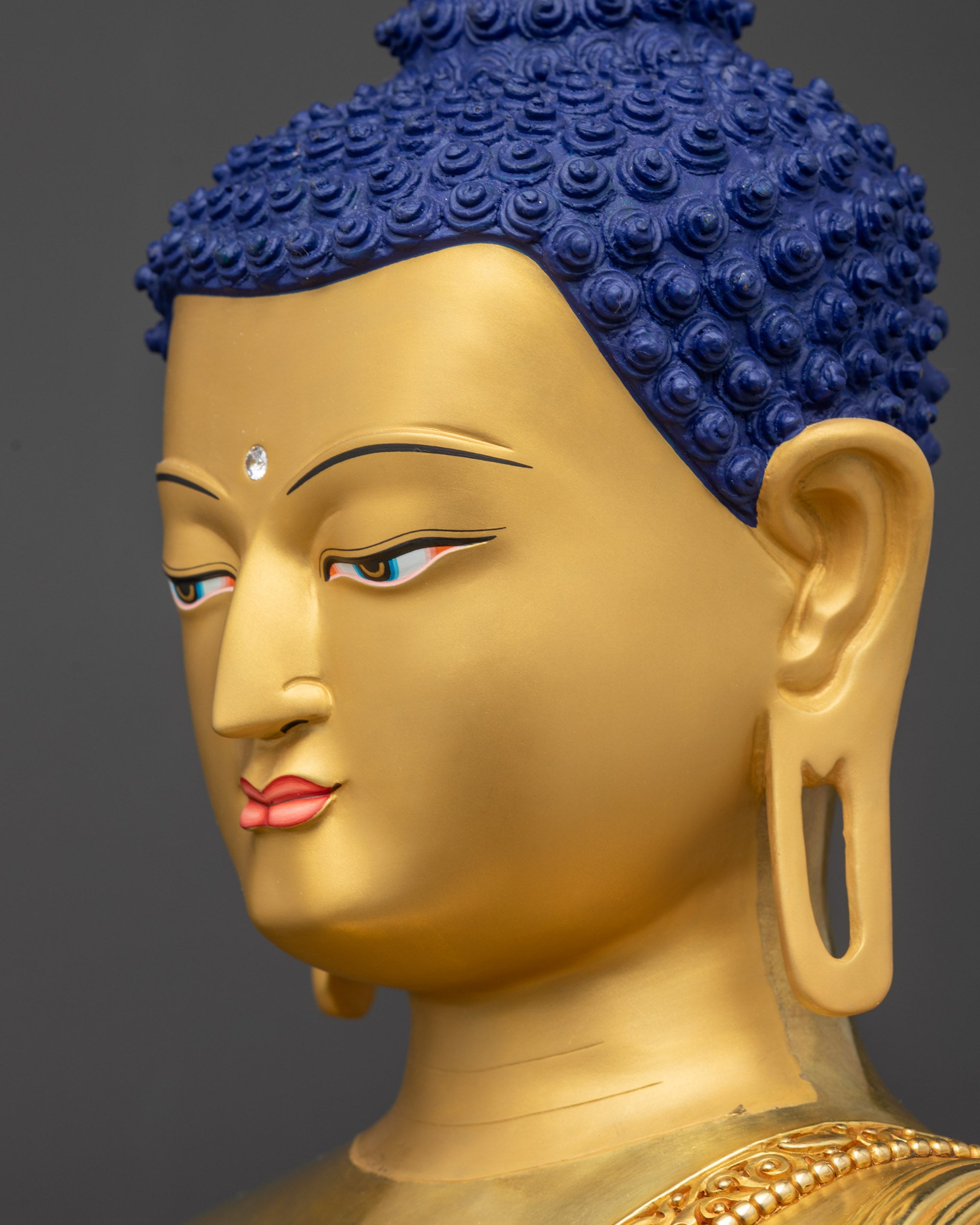 Side close up face Shakyamuni Buddha with calm features for mindfulness practice
