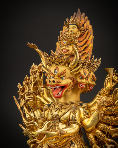 Side close up highlighting 3D carvings, gold fire-gilded surface, and intricate Vajrabhairava ritual details