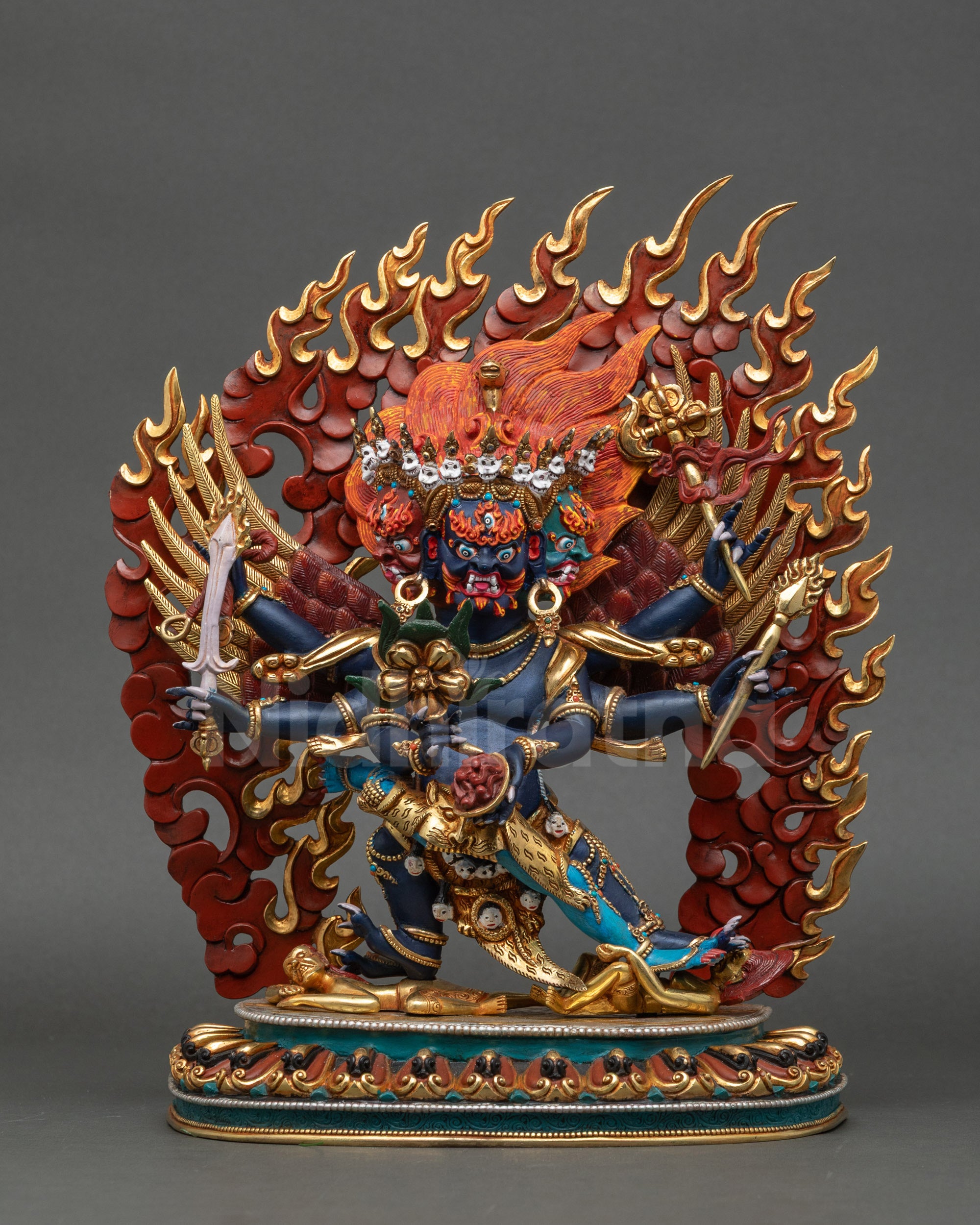 Side close up of Hayagriva statue highlighting lotus seat and blazing halo