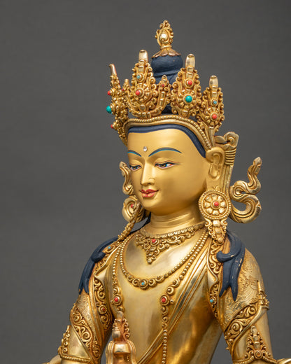 Side close up of Jizo Kshitigarbha statue highlighting robe patterns and stone adornments