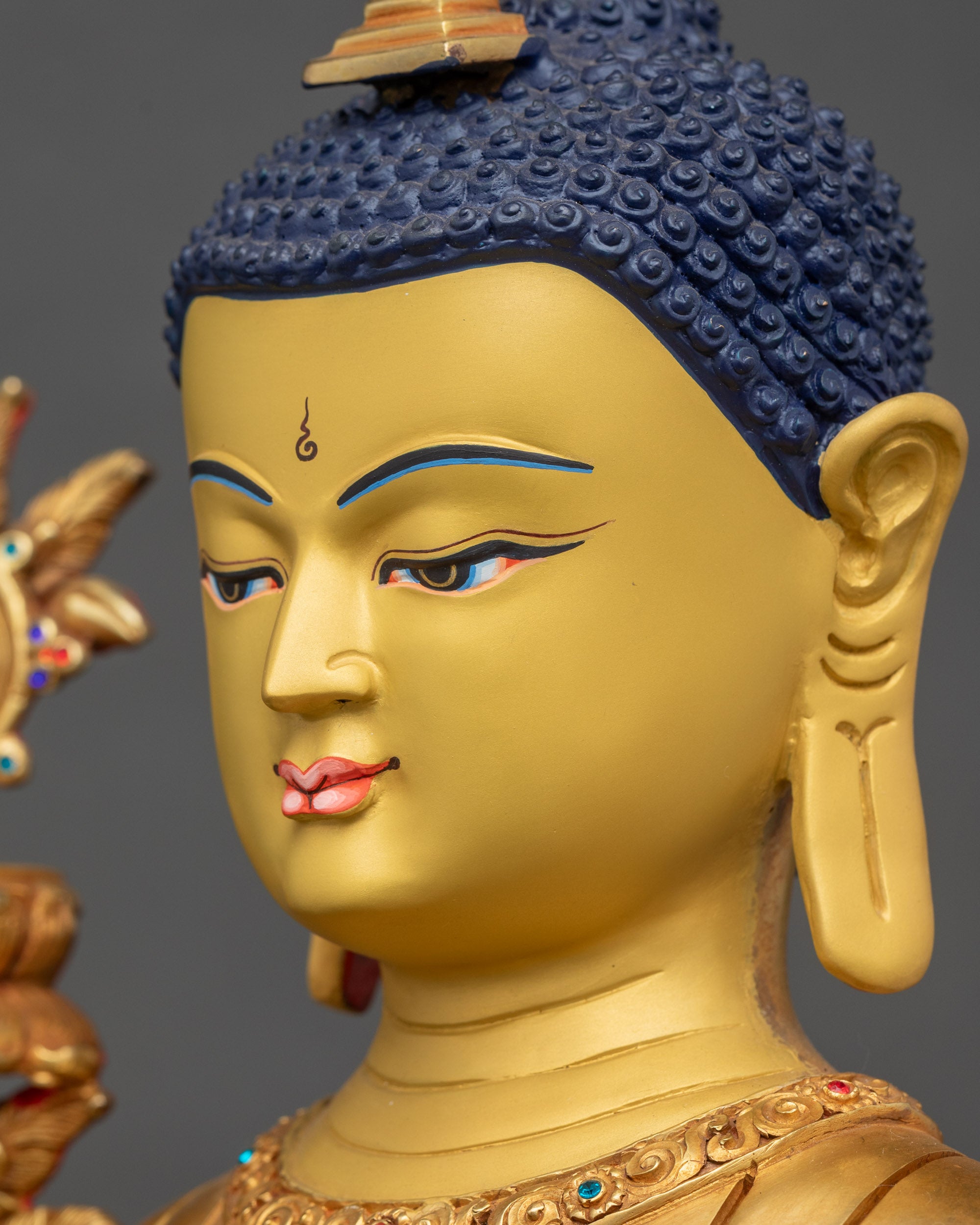 Side close up of Maitreya Buddha face, intricate gold detailing and compassionate gaze, Nepalese sculpture
